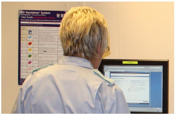 blond man look on a scream computer 